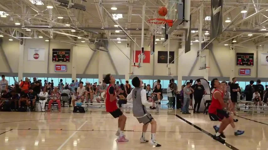 Young athletes tracking the ball under the rim in DSC Performance Basketball Skill Training
