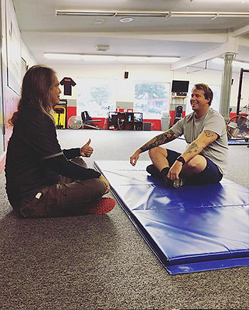 Kevyn Dean coaching an early DSC Performance athlete
